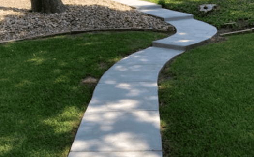 Curved-Concrete-Walkway-to-Back-Door-1-1.png